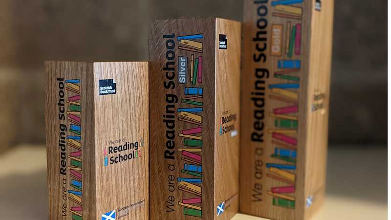 Core, Silver and Gold Reading Schools trophies